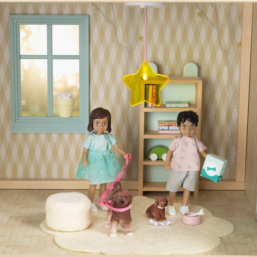 Lundby dolls house doll taking care of her pet dog, with a dog bed, bowl and pet accessories from the Lundby Dog Pet Set.